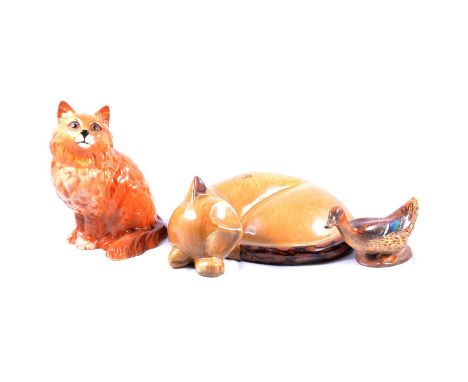 Collection of ceramic cat figurines, other animal figurines, including an early Royal Doulton Mallard Duck head forward HN150