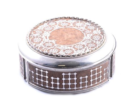Dutch silver and burr wood drum-shape box, marked Begeer floral decoration to the panelled lid, the side with trellising, dia