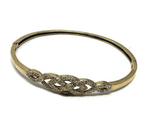 9ct gold diamond bangle (9.1g) 