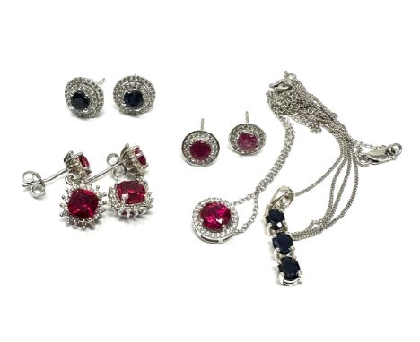 Five Silver Ruby And Sapphire Set Jewellery Pieces Comprising Pendant Necklaces And Earrings (18g) 