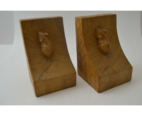 Robert Thompson "Mouseman" of Kilburn, a pair of oak bookends, featuring signature mouse on each sloping side, 15cm high