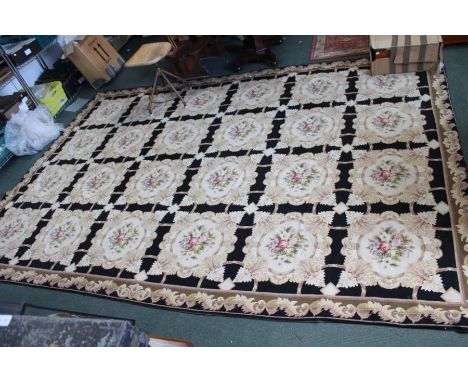 A large tapestry wool work carpet