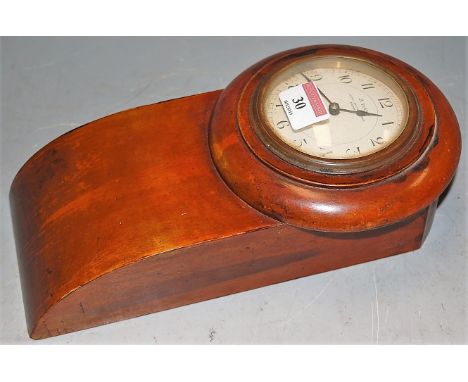 An early 20th century miniature mahogany cased droptrunk wall clock, having convex enamel dial with Arabic numerals, signed J
