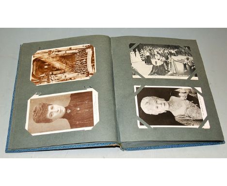 A postcard album and contents, largely being tourist cards and greeting cards