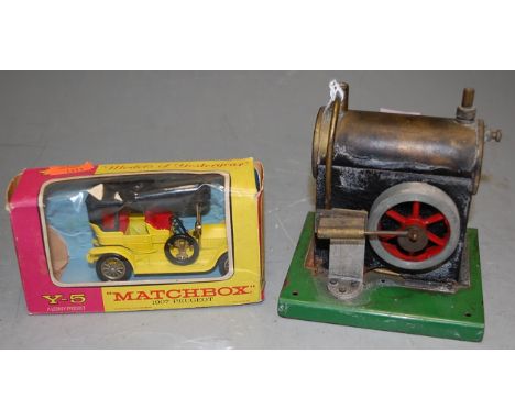 A miniature spirit fired stationary engine, probably Mamod; together with a Y-5 Matchbox 1907 Peugeot in box (2)