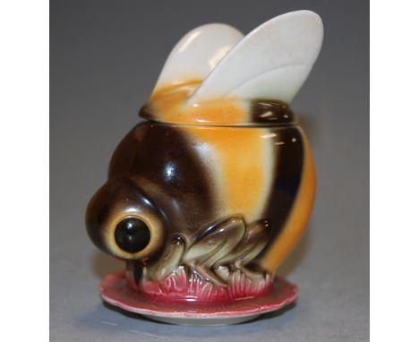 A Goebel novelty honey pot and cover in the form of a bee, having printed mark verso, impressed 2956, h.12cm