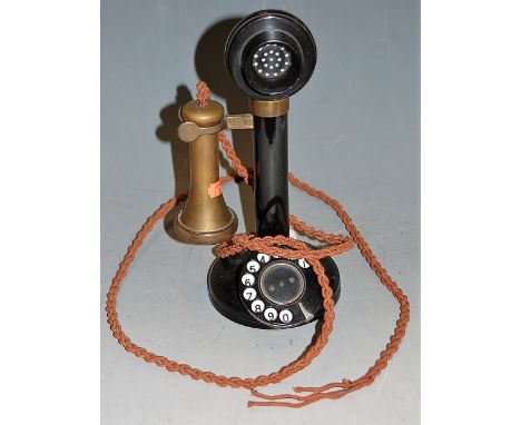 An early 20th century bakelite and brass stick telephoneMinor wear throughout.Not converted.Original wire.Requires cleaning.