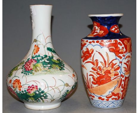 A Chinese bottle vase enamel decorated with birds amongst foliage having red seal mark verso, height 24cm, together with a Ja