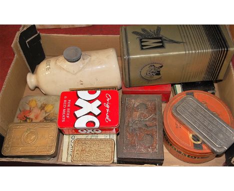 A box of miscellaneous items to include stoneware foot warmer and lithograph printed tins etc.