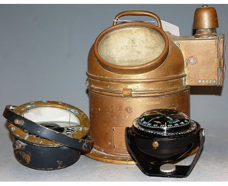 A brass cased ships compass mounted on gimbel signed Lilley &amp; Reynolds Ltd. London EC3, together with one other Suunto Co