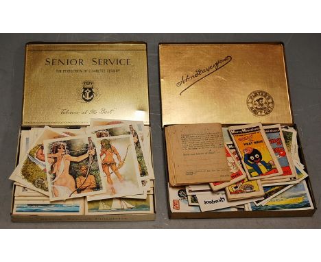 A quantity of loose cigarette cards, in two small lithograph printed metal tins