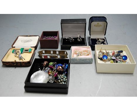 A large collection of assorted costume jewellery to include enamel butterfly brooches, earrings, beaded and other necklaces, 