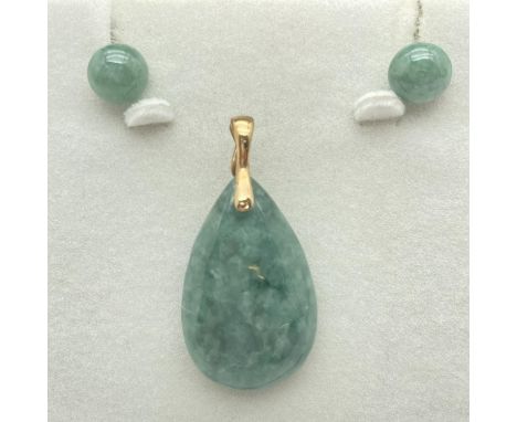 A pair of 9ct gold and jade stud earrings together with a matching teardrop shaped pendant with 9ct gold clip fastening bale.