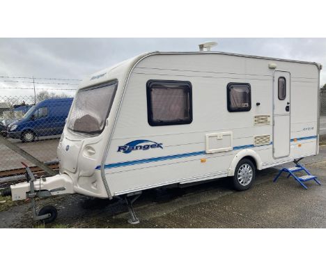 A 2004 4 berth Bailey Ranger 470/4 touring caravan with awnings and many extras &amp; accessories to include integral aerial.