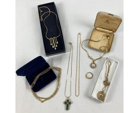 A collection of boxed and unboxed vintage gold tone jewellery. To include green jade cross pendant on gold tone chain and 2 v