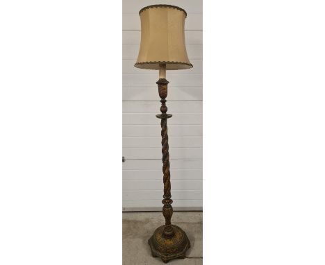 A vintage Chinese green lacquer standard lamp with twisted design column and octagonal base. Painted with gilt dragons and ci
