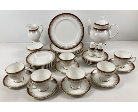 A collection of Royal Grafton dinner &amp; tea ware in burgundy and gold 'Majestic' pattern. Comprising: 6 x dinner plates, 6