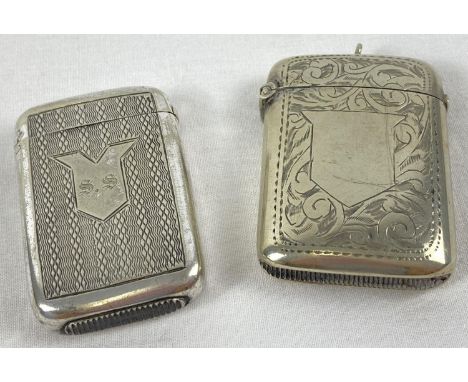 2 vintage silver plated vesta cases. A curved back vesta with scroll design engraving and empty shield shaped cartouche, mark