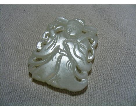 A small carved Jade(?) flat Figure, possibly depicting Bhudda.