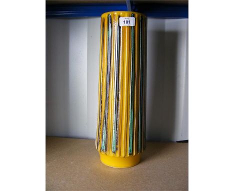 A large Poole Vase, with lined black decoration over an orange base and dark blue interior, stamped and numbered 85 to base, 