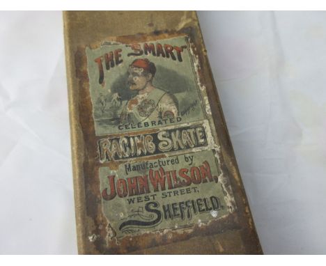 Boxed pair of vintage Ice Skates, and one other.