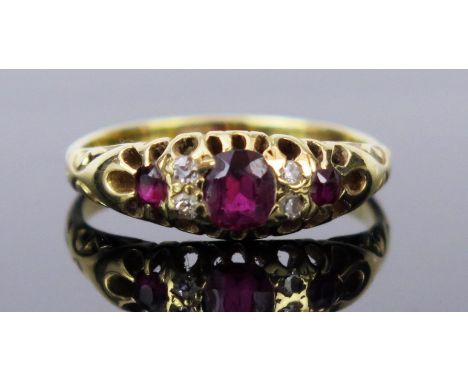 Ruby and Old Cut Diamond Ring in an 18ct stamped gold setting, c. 4.9x4.2mm central stone, size P.75, 3.6g 