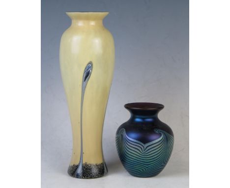 A Caithness glass vase of Art Nouveau influence of ovoid form with sinuous lines to an ivory ground, 26cm high, together with