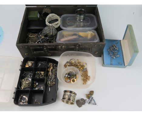 A Case of Costume Jewellery, silver napkin ring, silver A.R.P. badge, etc.