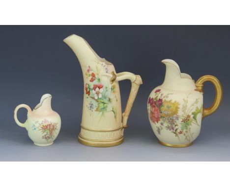 A Royal Worcester blush ivory cream fug, of ovoid form, decorated with floral sprays with gilded reeded handle, a smaller cre