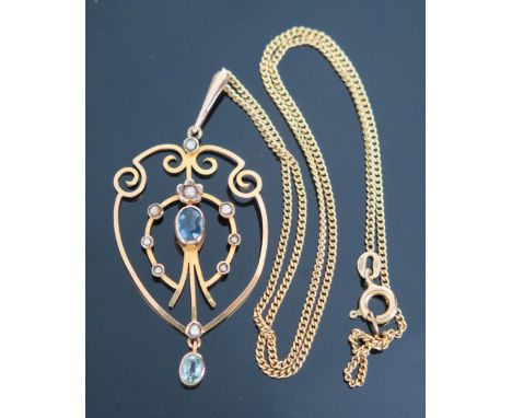 An Art Nouveau Gold and untested Split Pearl Pendant, with inset blue stones, unmarked, together with a fine 9ct gold chain, 