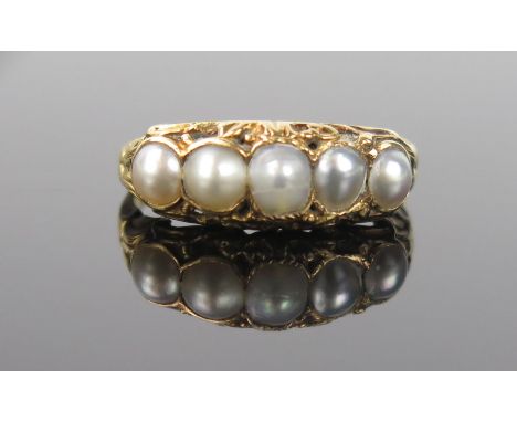 An Antique Split Pearl Ring in a high carat unmarked gold setting, size K, 3.3g