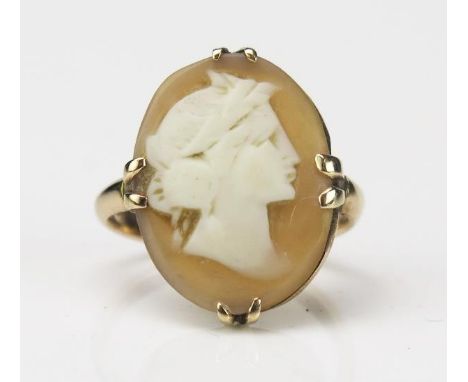 An Antique Yellow Metal Cameo Ring, the cameo of a classic woman's head, not marked, ring size E, 3.5g