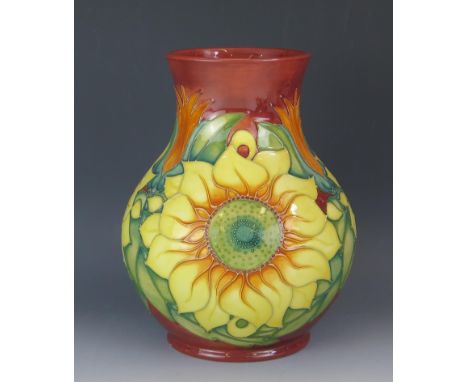 A Moorcroft pottery vase of ovoid form, with Inca pattern with sunflower decoration, 24cm high. 