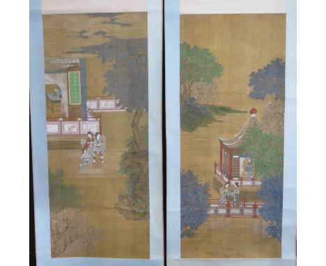 A pair of late 19th century Chinese scroll work pictures, depicting figures in a pagoda landscape, and women and child in a f
