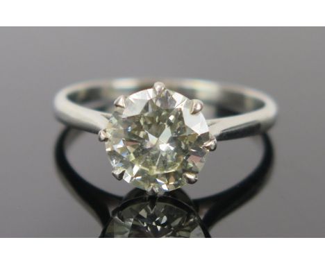 Brilliant Round Cut Diamond Solitaire Ring in an unmarked platinum or white gold setting, size M.5, 3.2g. EDW 2.1ct and estim