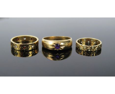 9ct Gold and Amethyst Gypsy Ring (size P.5, 3.5g) and two 9ct gold eternity rings (K.5 &amp; H.25, 4.7g)