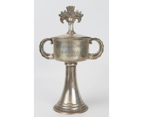Arts &amp; Crafts "CHILTERN MUSIC FESTIVAL" Two Handled Presentation Cup and cover decorated with a stylised sheaf, 25cm high