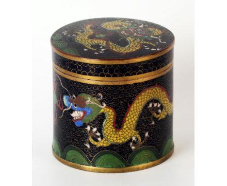 Chinese Cloisonné Box, of circular form, pull off lid, decorated with a yellow dragon chasing a flying pearl on a black groun