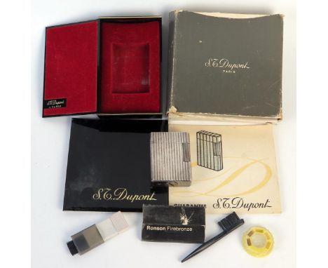 S. J. Dupont Cased Silver Lighter, numbered to the base E F 4026, sold with box and papers. Flint wheel spins, not tested 