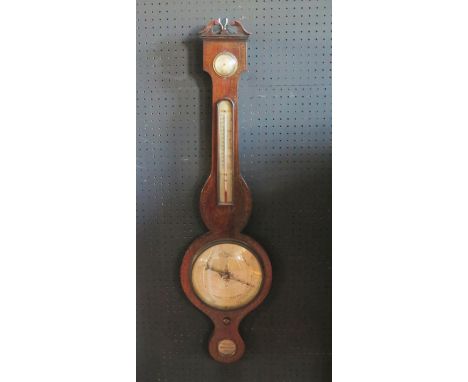 A simulated rosewood and inlaid cased wheel barometer, with broken swan neck pediment, hygrometer, alcohol thermometer, 20cm 