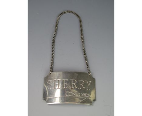 An Elizabeth II silver Concorde "Sherry" label, maker British Airways, Birmingham, 1986, 5cm wide, 14gms, 0.47ozs 