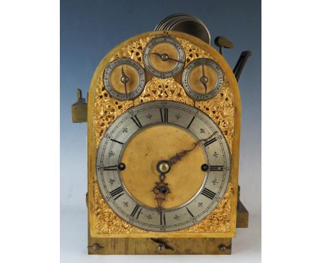 A late 19th century mahogany directors clock of arched outline, the arched brass dial with silvered Roman chapter ring, with 