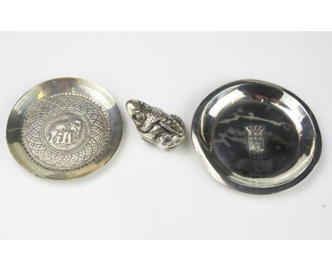 An Indian silver small coaster, 7.5cm diameter, a small continental silver dish, 8cm diameter and a silver model of a toad, t