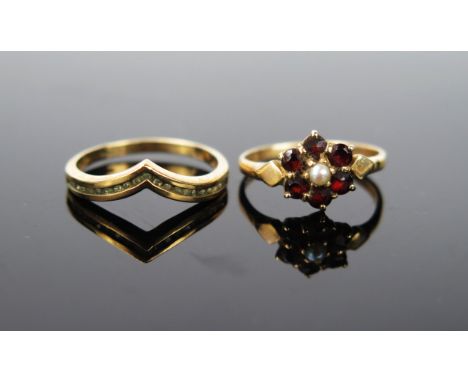 Two 9ct gold rings one with flower head of garnet with split pear, sizeK.5, the other with diamond chips, 2.8g, ring size app