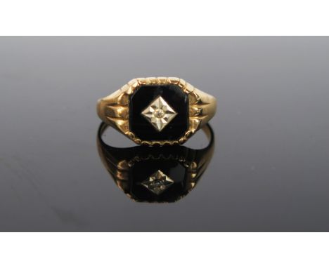 A 9ct Gold, Onyx and Diamond signet ring, size R, 2.5g