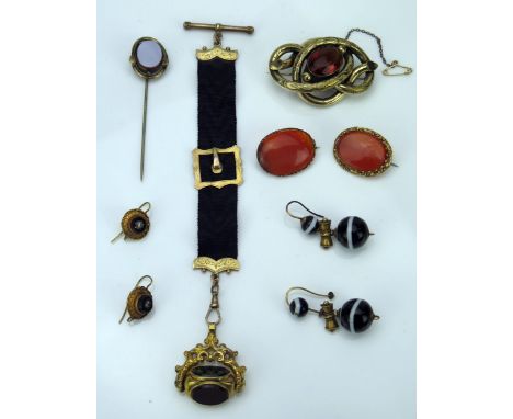 Victorian Triple Faced Swivel Fob set with carnelian, bloodstone and foil backed quartz in an unmarked gold setting and on a 