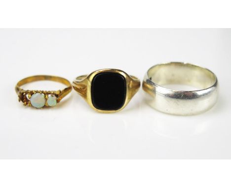 A 9ct Gold Gentleman's Signet Ring, with a rounded rectangular plaque, a 9k Opal ring, one stone missing, 5.8g total, and a h