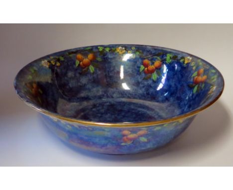 An early 20th century pottery wash basin, with floral transfer print decoration, 41cm diameter, 
