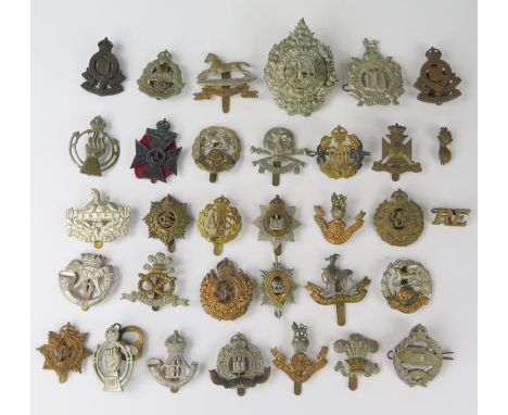 A collection of assorted British army and Airforce cap badges, various regiments. 