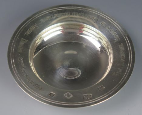 An Elizabeth II silver armada type dish, maker John Henry Odell, London, 1973, inscribed, of circular form, 9.5cm diameter, 6